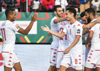 Tunisia's players celebrate after scoring a goal during the Group F Africa Cup of Nations (CAN) 2021 football match between Tunisia and Mauritania at Limbe Omnisport Stadium in Limbe on January 16, 2022. (Photo by Issouf SANOGO / AFP)