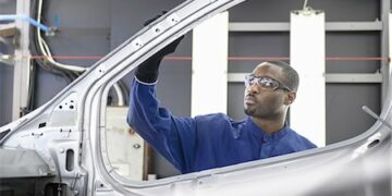 649-06489458
© Masterfile Royalty-Free
Model Release: Yes
Property Release: Yes
Worker inspecting car in factory
